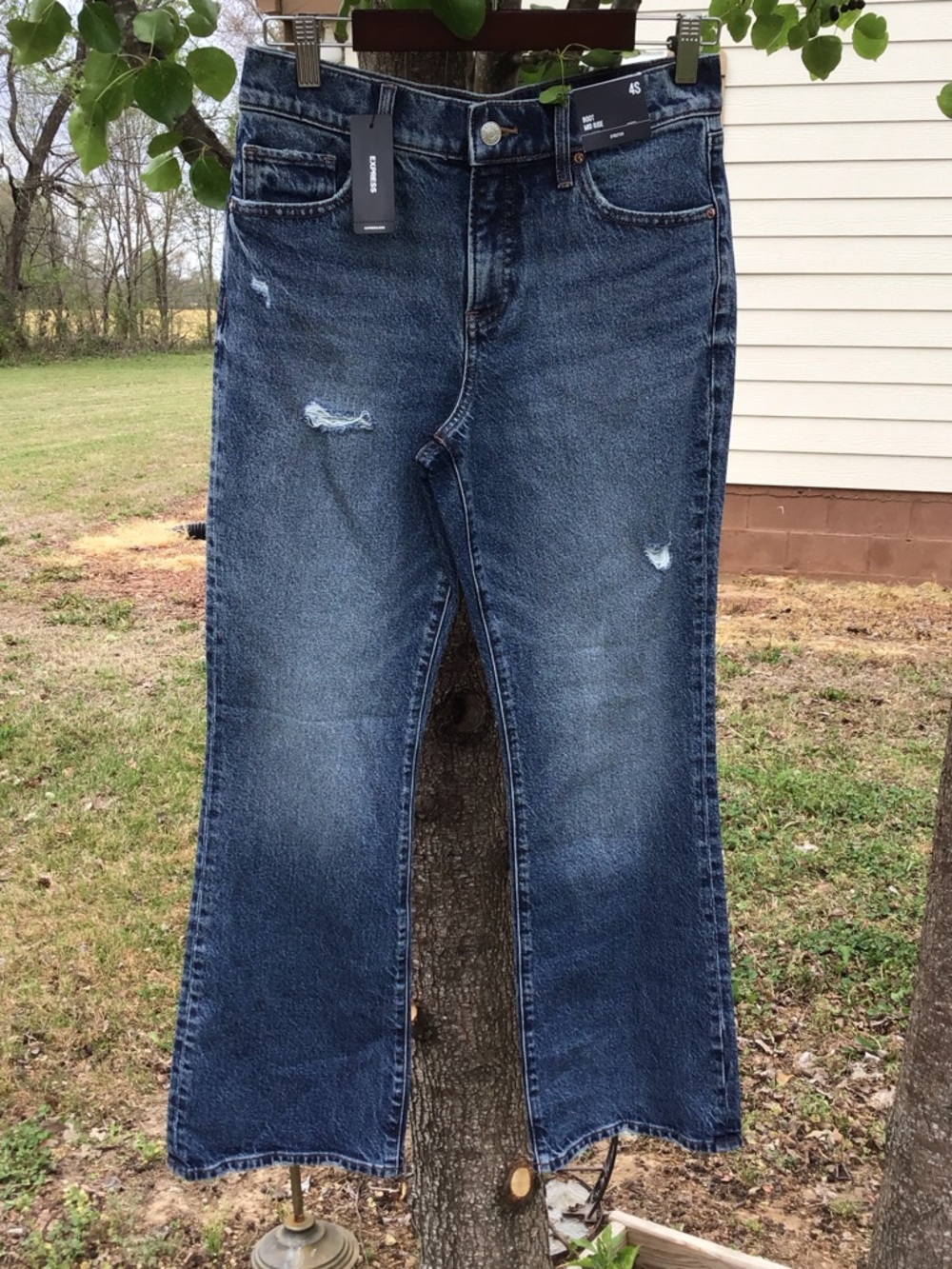 Express Women's White Wash Blue Boot Cut Jeans with Distressed Accents